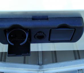 The glove box has twin fold-out drink holders.